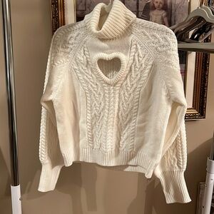 Woman’s knitted sweater medium